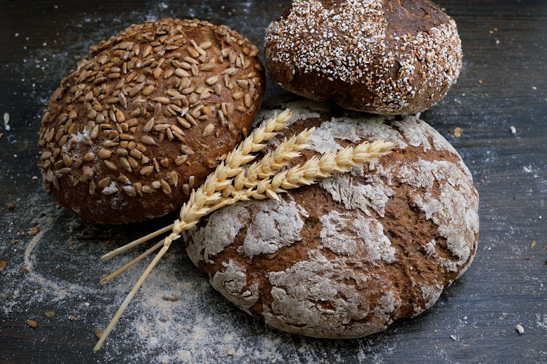 Seeded loaves, flour still on them