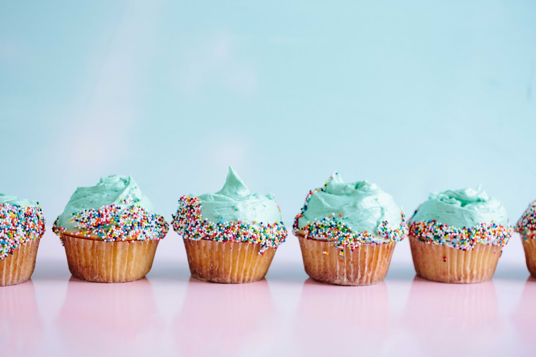 Sprinkle cupcakes in a row